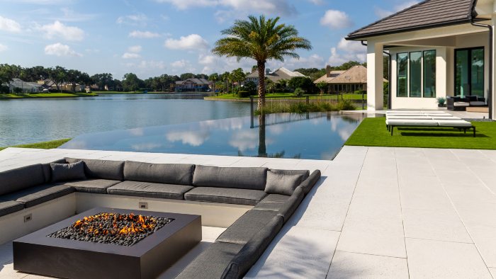 An inviting patio scene with a fire pit and lounge chairs, part of a case study by JSK Marketing